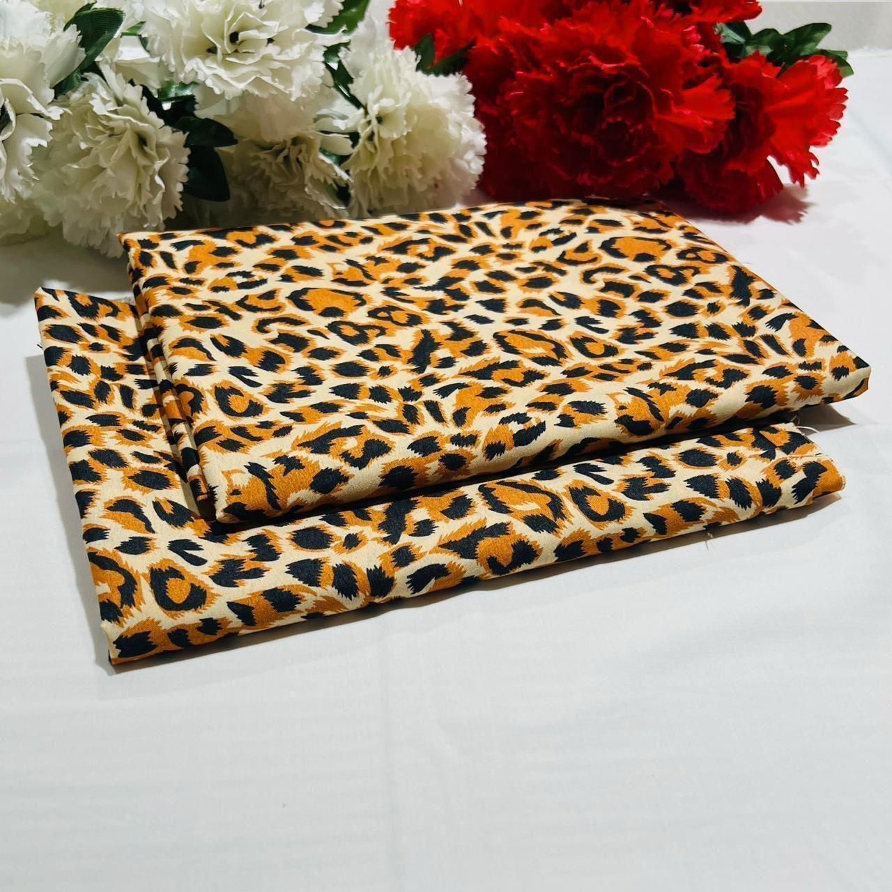 Unstitched golden-yellow base with bold black and dark brown leopard spots - Up Trends