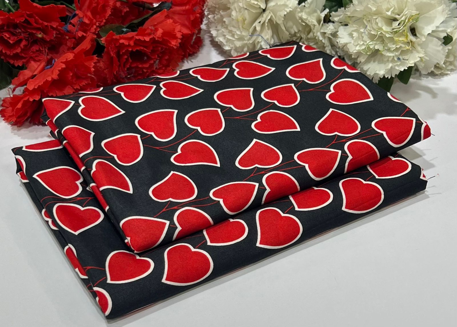 Unstitched Vine of Hearts-black base and red heart vine pattern outlined in white - Up Trends